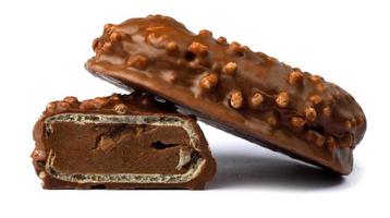 Sweets with crisp waffles in chocolate are isolated on a white background. photo