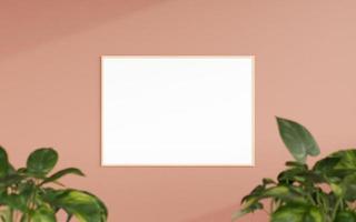 Clean and minimalist front view horizontal wooden photo or poster frame mockup hanging on the wall with blurry plant. 3d rendering.