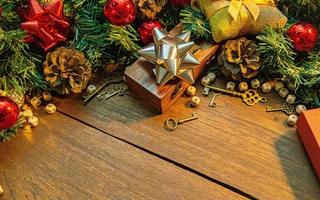 Christmas decorations on wood table for holiday content. photo