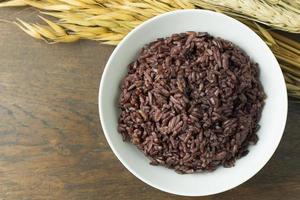 Cooked rice berry Whole grain rice Thai black jasmine rice photo