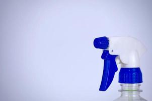 Close up of a spray nozzle on white background. photo