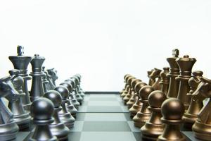 gold and silver chess on board close up image abstract Background. photo