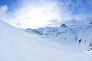 High mountains under snow in the winter photo