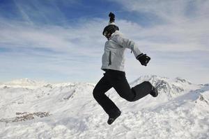 people group on snow at winter season photo