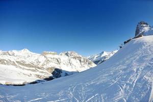 High mountains under snow in the winter photo