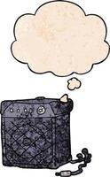cartoon guitar amp and thought bubble in grunge texture pattern style vector