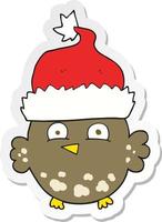 sticker of a cartoon owl wearing christmas hat vector