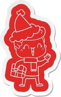 cartoon  sticker of a laughing boy wearing santa hat vector