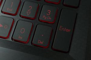 The enter button on keyboard laptop close up image. photo