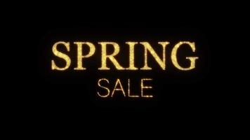 Spring Sale golden flickering text animation black background. video