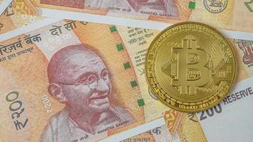 India banknote and bit coin  for business content. photo