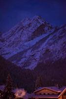 mountain village in alps  at night photo