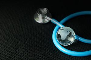 stethoscopes on black background image close up photo