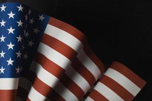 The Veterans Day  concept united states of America flag on black background. photo