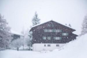 mountain house in snowstorm