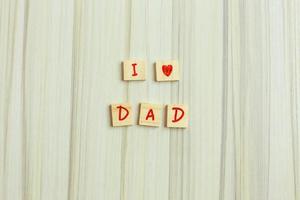 alphabet on small plate on wood table for Father  day image. photo