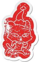 cartoon distressed sticker of a cat out for a run wearing santa hat vector