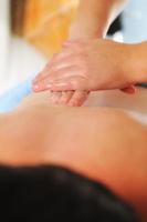 back massage at the spa and wellness center photo