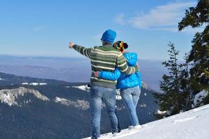 Young Couple In Winter  Snow Scene photo