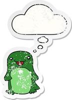cartoon penguin and thought bubble as a distressed worn sticker vector