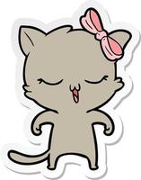 sticker of a cartoon cat with bow on head vector