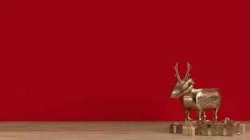 The gold deer and gift box on wood table for celebration time 3d rendering. photo