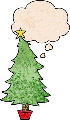 cartoon christmas tree and thought bubble in grunge texture pattern style