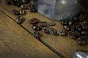 vintage roaster coffee  on wood table. photo