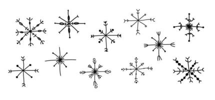 Set of abstract snowflakes in doodle style. vector