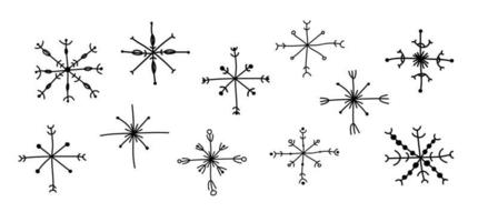 Set of abstract snowflakes in doodle style. vector