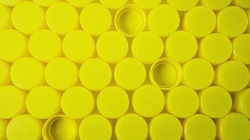 yellow Bottle  plastic cap for ego background. photo