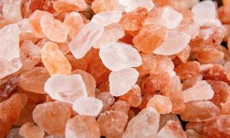 Background of pink Himalayan salt close-up. photo