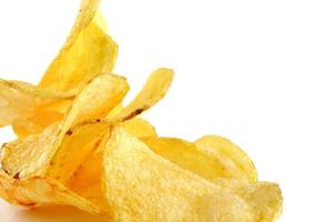 A bunch of potato chips on a white background. photo