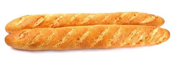 Two French baguettes are isolated on a white background. photo