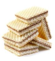 Delicious crisp waffles are isolated on a white background. photo