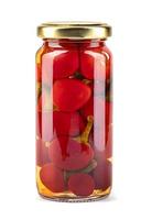 A glass jar with ripe preserved peppers is isolated on a white background. Full clipping path. photo