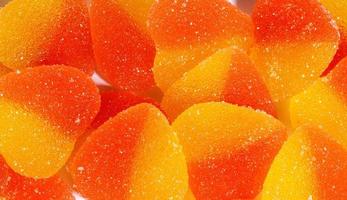 Background of many marmalade hearts. Heart-shaped candy. photo