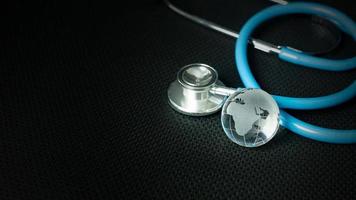 stethoscopes on black background image close up photo