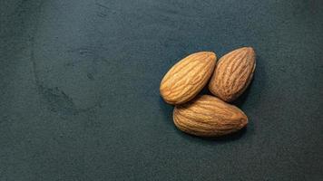 The Almond on black Ceramic Plate close up image. photo