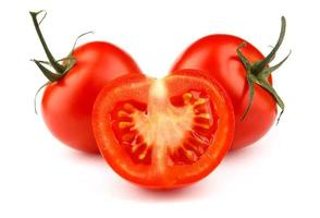 Two ripe juicy tomatoes with a half are isolated on a white background. Full clipping path. photo