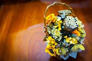 Dried floral bouquet in a basket photo