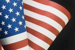 The Veterans Day  concept united states of America flag on black background. photo