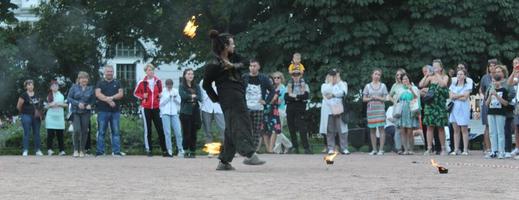 Unplugged free street event fire eater street artist. High quality photo