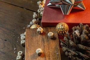 Christmas equipment decorations on wood background for holiday concept. photo