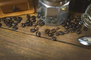 vintage roaster coffee  on wood table. photo