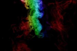 Abstract smoke isolated on black background,Rainbow powder photo