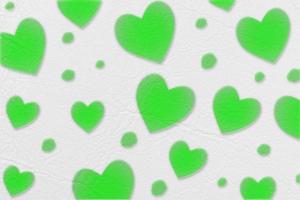 corazón verde abstracto aislado en cuero blanco o textura de papel, día de san valentín y concepto de amor. foto