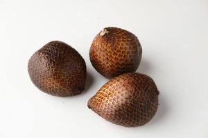 Salak or thorny palm or snake fruit, Salacca zalacca is a species of palm tree. Selective focus image. photo