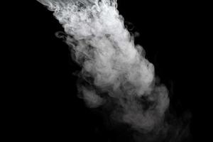 Abstract powder or smoke isolated on black background photo