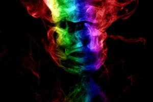 Abstract smoke isolated on black background,Rainbow powder photo